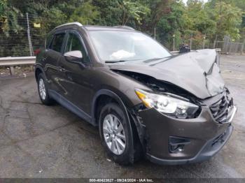  Salvage Mazda Cx