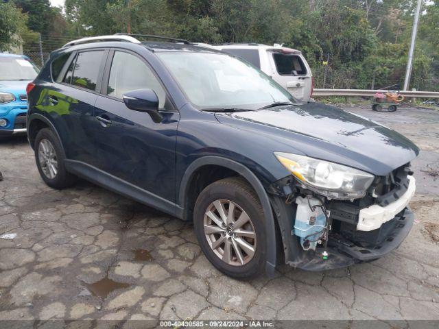  Salvage Mazda Cx